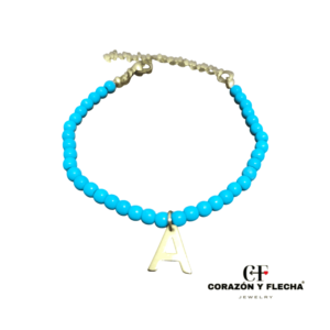 Pulsera turquesa con inicial acero dorado